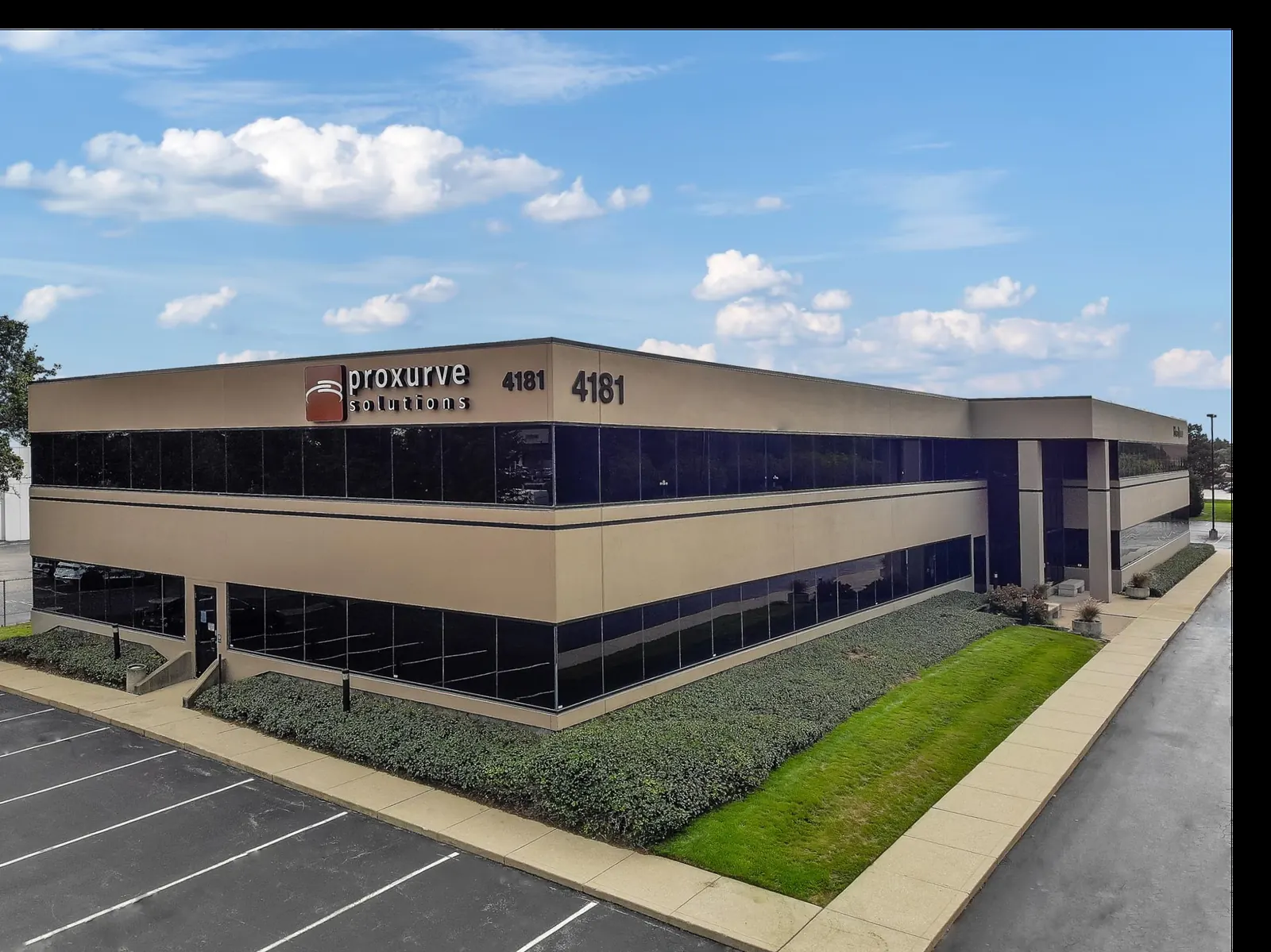 The Proxurve Solutions building entrance at 4181 E 96th Street in Indianapolis, Indiana