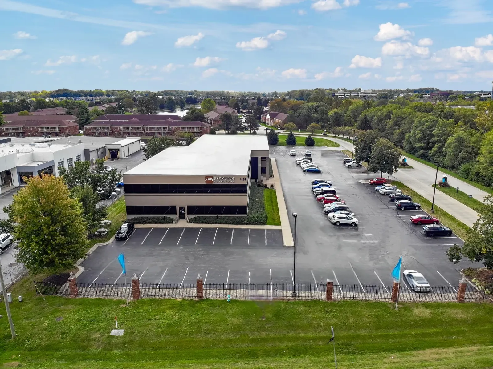 Aerial view of the Proxurve Solutions building and grounds on East 96th Street, Indianapolis